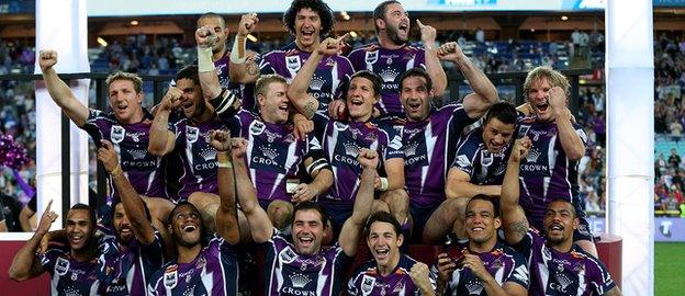 Ryan Hinchcliffe and his Melbourne teammates celebrate the 2012 premiership