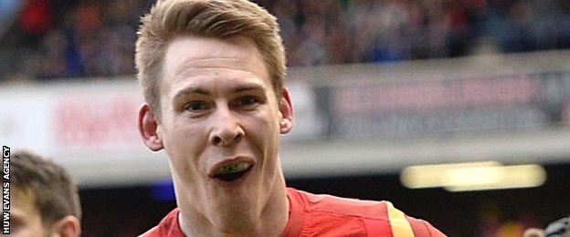 Liam Williams celebrates the opening try at Murrayfield