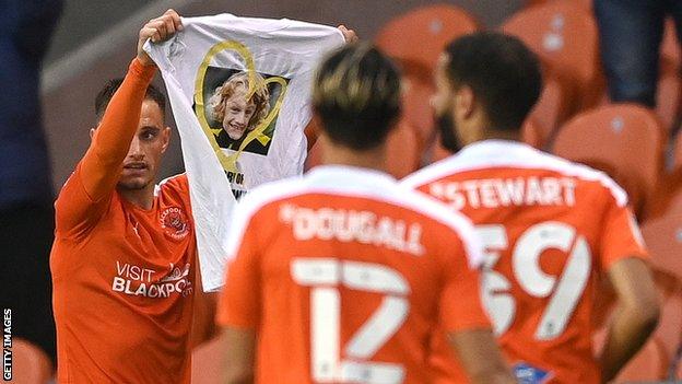 After scoring Blackpool's third goal, Jerry Yates held up a t-shirt commemorating nine-year-old Blackpool boy Jordan Banks who was killed after being struck by lightning