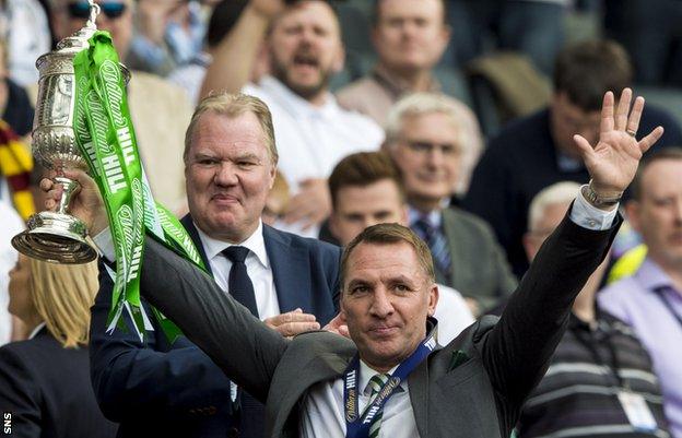 Celtic manager Brendan Rodgers lifts the Scottish Cup