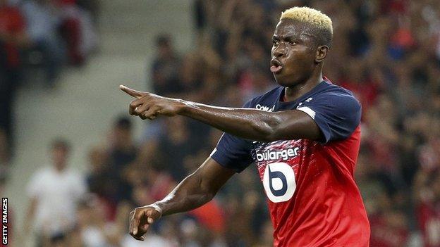 Victor Osimhen celebrates a goal for Lille in Ligue 1.