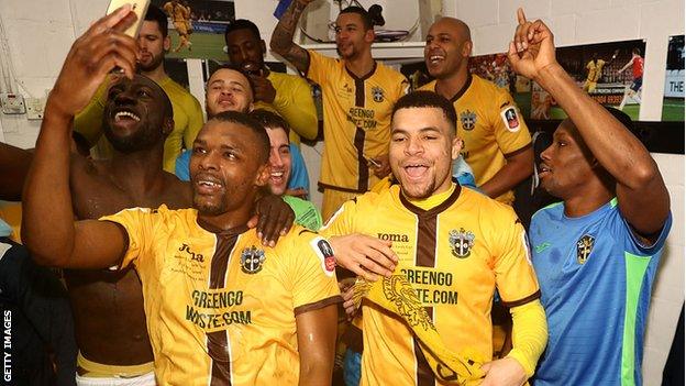 Sutton United players celebrate