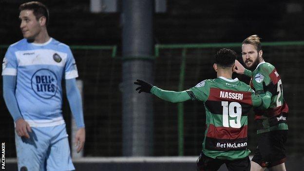 Hrvoje Plum celebrates his winning goal for Glentoran against Warrenpoint