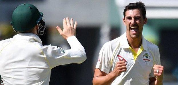 Mitchell Starc celebrates a wicket