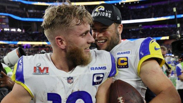 Cooper Kupp and Matthew Stafford celebrate winning Super Bowl 56