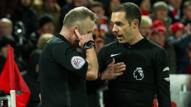 Referee Jon Moss (left) and assistant Eddie Smart