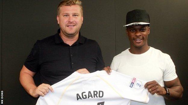 Karl Robinson and Kieran Agard