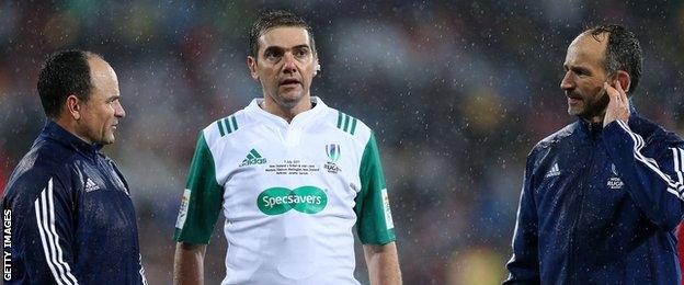 Jerome Garces consults with his officials