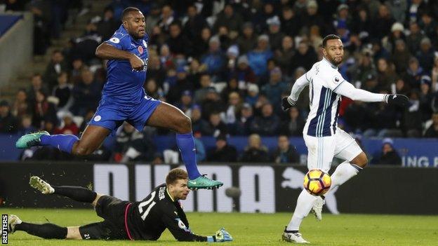 Matt Phillips (right) scores