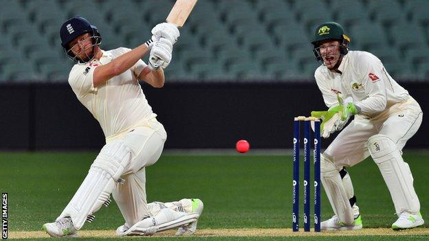 Wicketkeeper Tim Paine watches Jonny Bairstow bat in England's second warm-up game in Adelaide