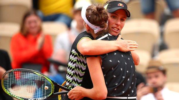 Johanna Konta embraces Marketa Vondrousova after the defeat