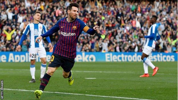 Lionel Messi celebrates scoring