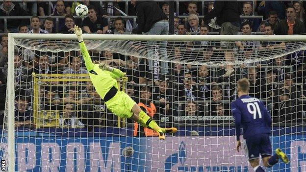 Craig Gordon makes a save from Pieter Gerkens' long-range shot