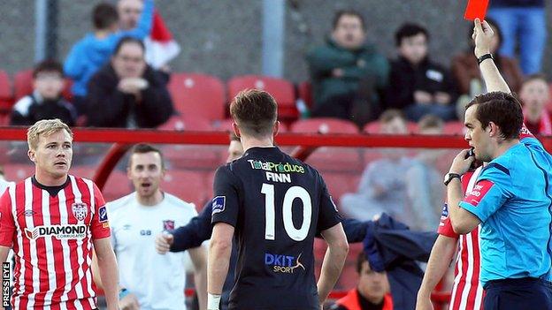 Conor McCormack was sent off by referee Robert Harvey