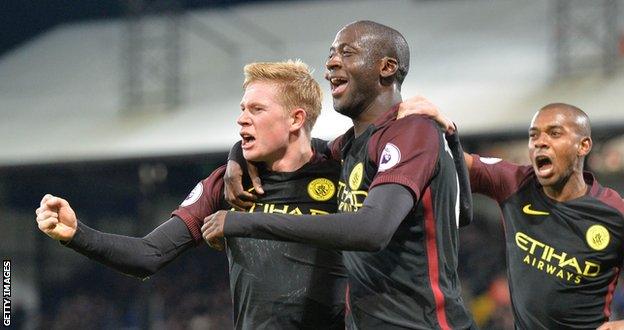 Yaya Toure celebrates his second goal against Palace with Kevin de Bruyne, whose corner he converted