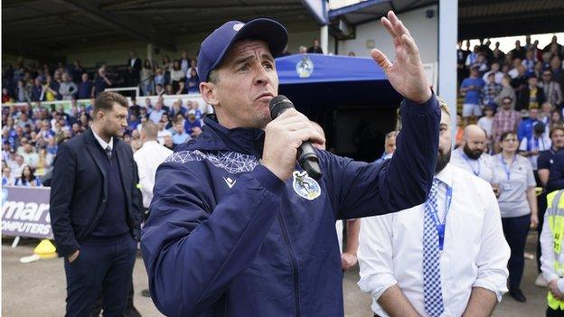 Bristol Rovers manager Joey Barton speaks to the home fans