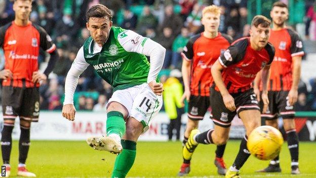 Hibernian's Stephen Mallan scores a first half penalty