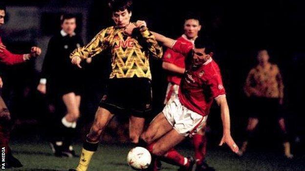 Arsenal's Alan Smith in action against Wrexham's Mark Sertori