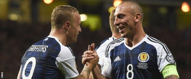 Scotland's Leigh Griffiths and captain Scott Brown celebrate against Malta