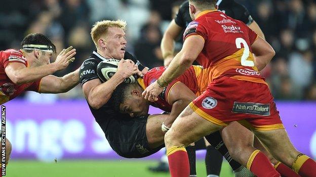 Ospreys flanker Sam Cross and his tackler Leon Brown, the Dragons prop, were surprise Wales call-ups this week