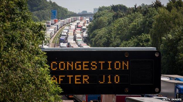 Lorries queue on the M20 as part of Operation Stack