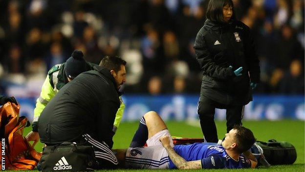 Josh McEachran receiving medical treatment