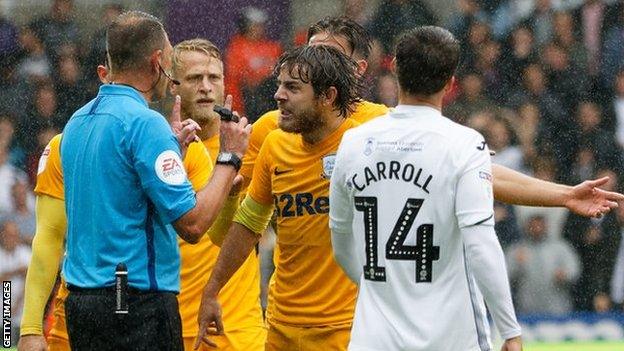 Declan Rudd protest to referee James Linington over a penalty award to Swansea