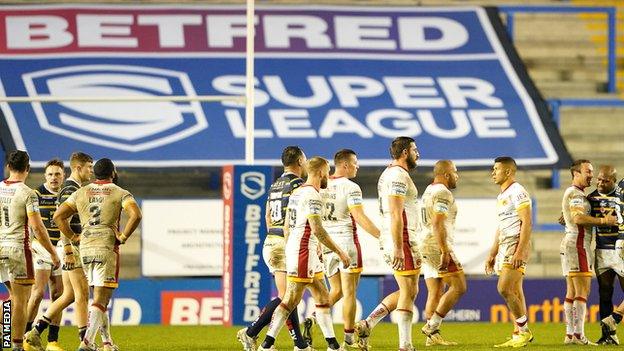 Leeds Rhinos and Catalans Dragons play at an empty Halliwell Jones Stadium in Warrington