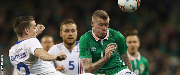 James McClean battles with Birkir Saevarsson at the Aviva Stadium