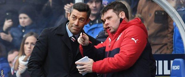 Pedro Caixinha and Graeme Murty chat in the Rangers dugout