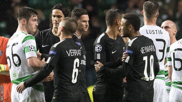 Celtic's Anthony Ralston (56) exchanges words with Neymar at full-time