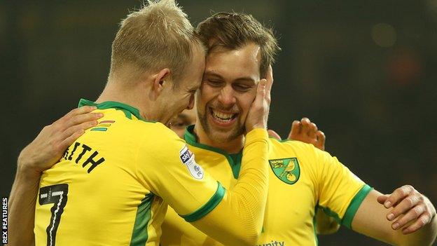 Steven Naismith congratulates Steven Whittaker after the latter scores for Norwich