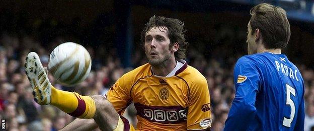 Jim O'Brien playing for Motherwell against Rangers