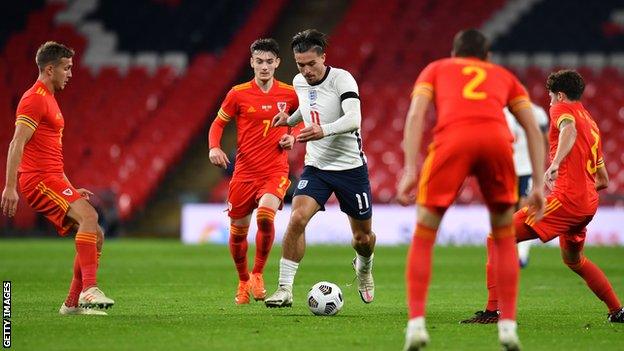 Jack Grealish (centre) in action for England against Wales