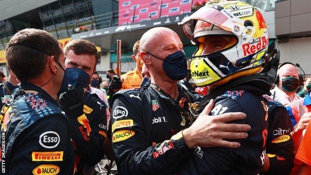 Max Verstappen celebrates winning the Austrian Grand Prix with his team