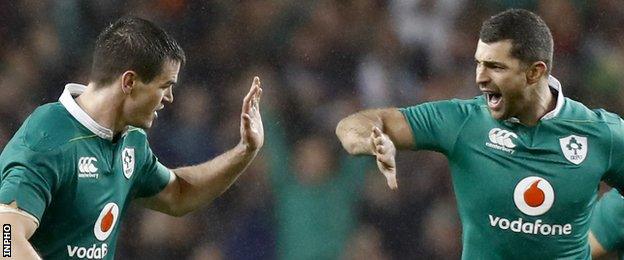 Johnny Sexton celebrates his well-taken drop-goal during the second half in Dublin