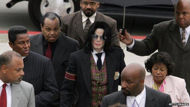 Michael Jackson surrounded by his family at the close of his trial in California on 2 June 2005