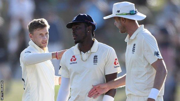 England captain Joe Root (left) and Stuart Broad (right) console Jofra Archer (centre) on day three of the first Test against New Zealand