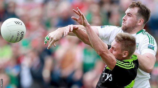 Mayo's Kevin Keand in action against Sean Quigley of Fermanagh at Castlebar