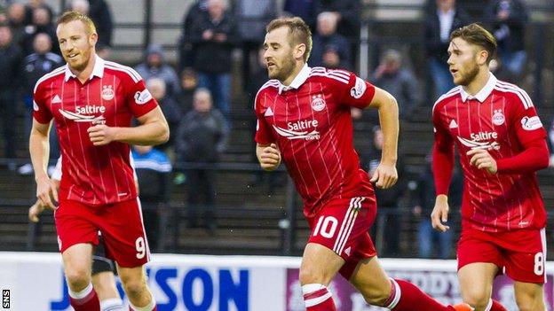 Adam Rooney (left), Niall McGinn and Wes Burns