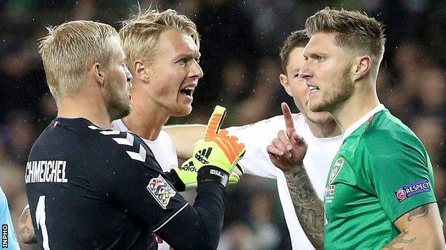 Kasper Schmeichel and Simon Kjaer remonstrate with Jeff Hendrick