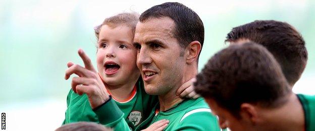 John O'Shea with his daughter Ruby as he prepared to win his 118th and final Republic of Ireland cap