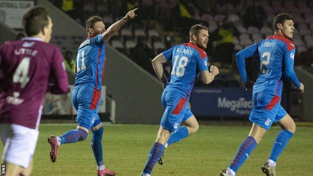 Inverness' Shane Sutherland (centre) celebrates making it 1-1