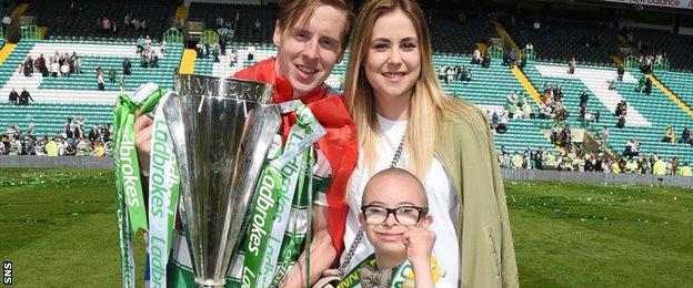 Celtic midfielder Stefan Johansen and young fan Jay Beatty