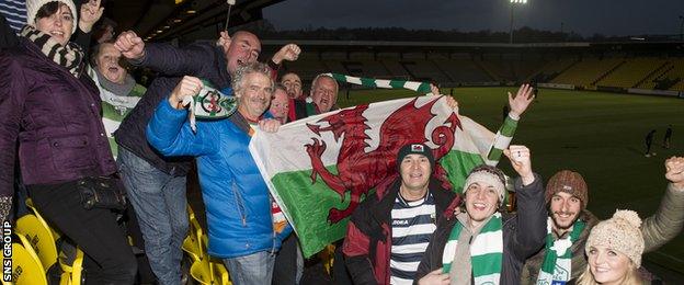 The small band of travelling supporters enjoyed the game despite appalling weather