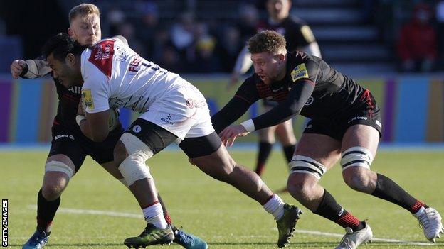 Leicester centre Manu Tuilagi carries the ball into contact