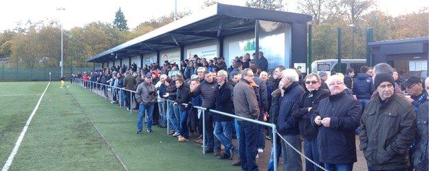 Fans line the pitch as East Kilbride face Forres Mechanics at K Park.