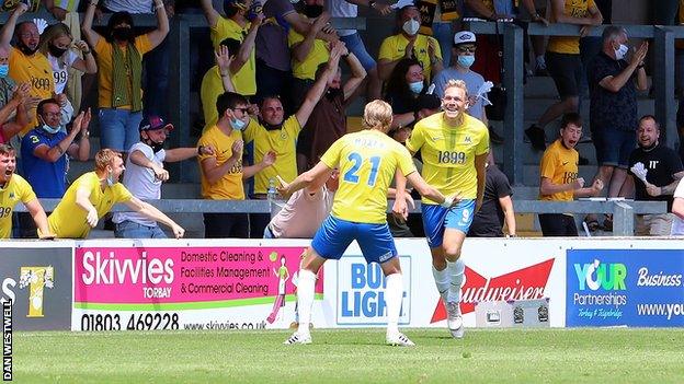 Torquay celebrate a goal against Notts County