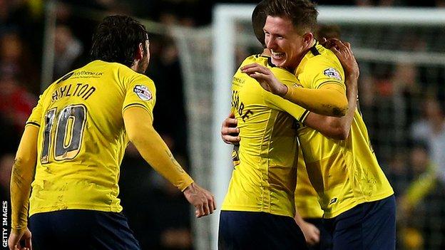 Oxford United celebrate reaching the Football League Trophy final