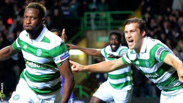 Celtic's Moussa Dembele and Erik Sviatchenko celebrate against Manchester City